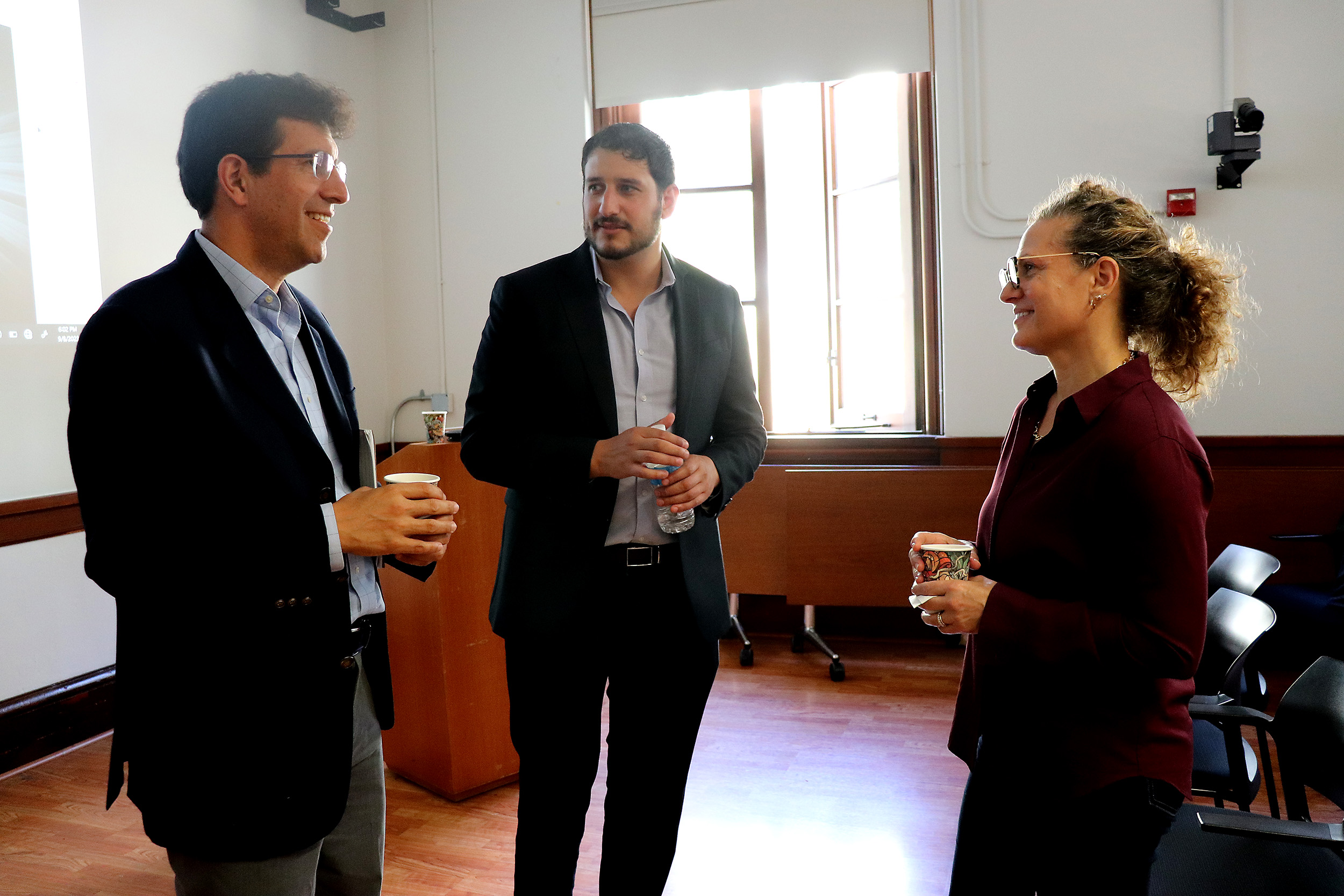ITS Director Daniel Rodriguez and Assistant Director Laura Melendy welcome Yotam Avrahami, Intelligent and  Yotam Avrahami, Intelligent and Green transportation lead commercial and PPP programs, Deloitte, to the ITS Transportation Seminar