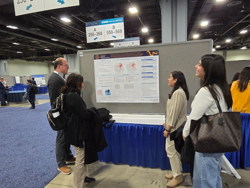 Jean Doig and Masuma Mollika Miti discuss poster