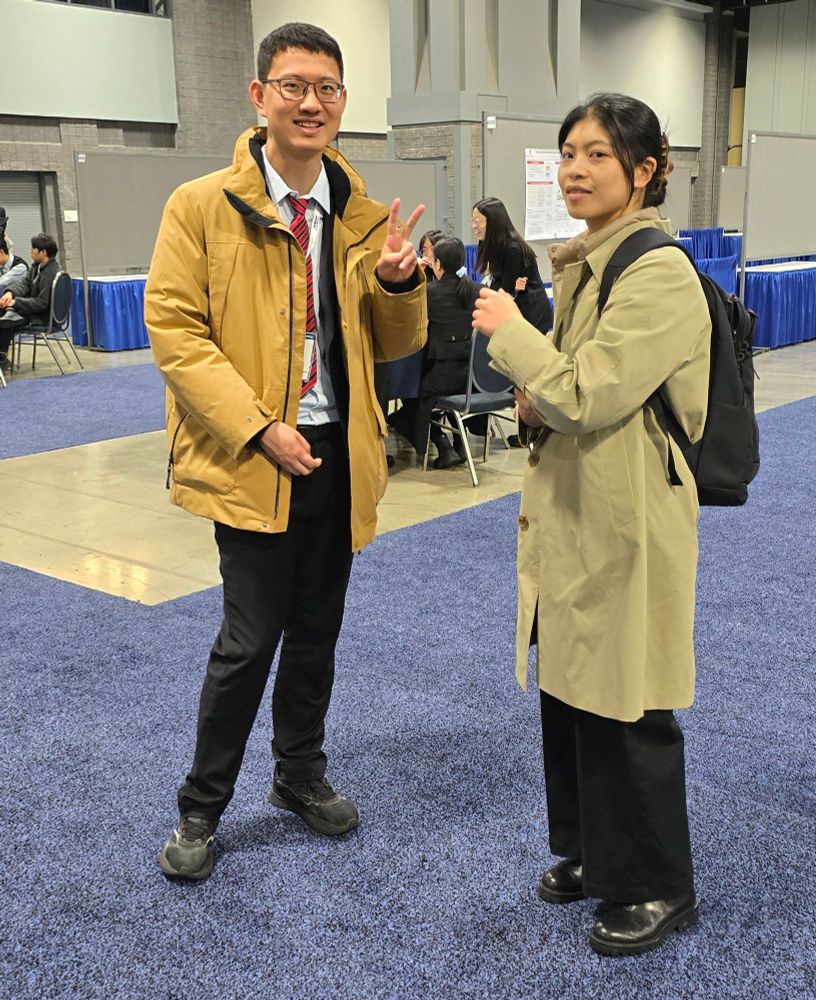 Siqi Feng and Phoebe Ho posing in poster hall