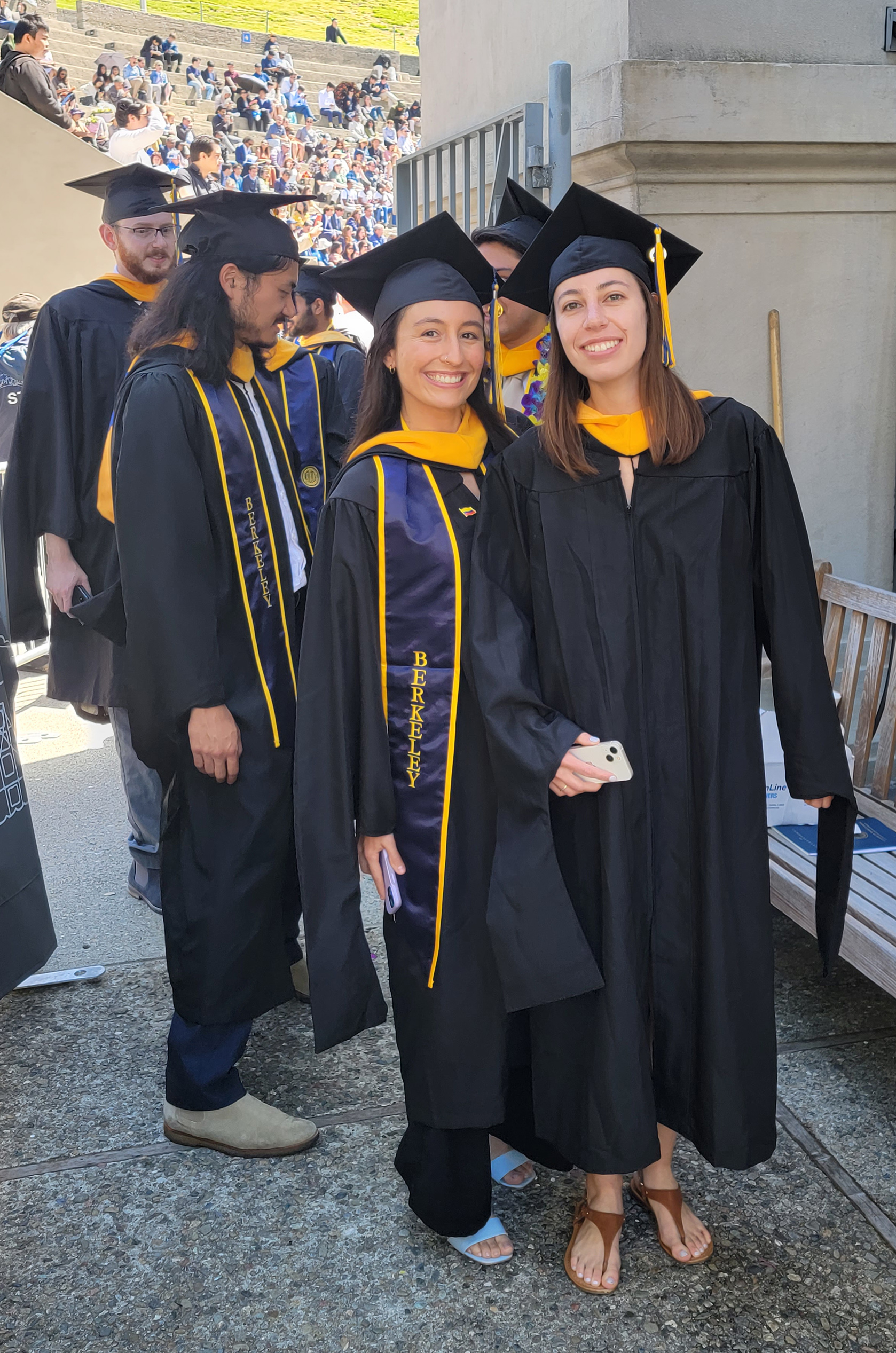 Master students ready to walk across the stage