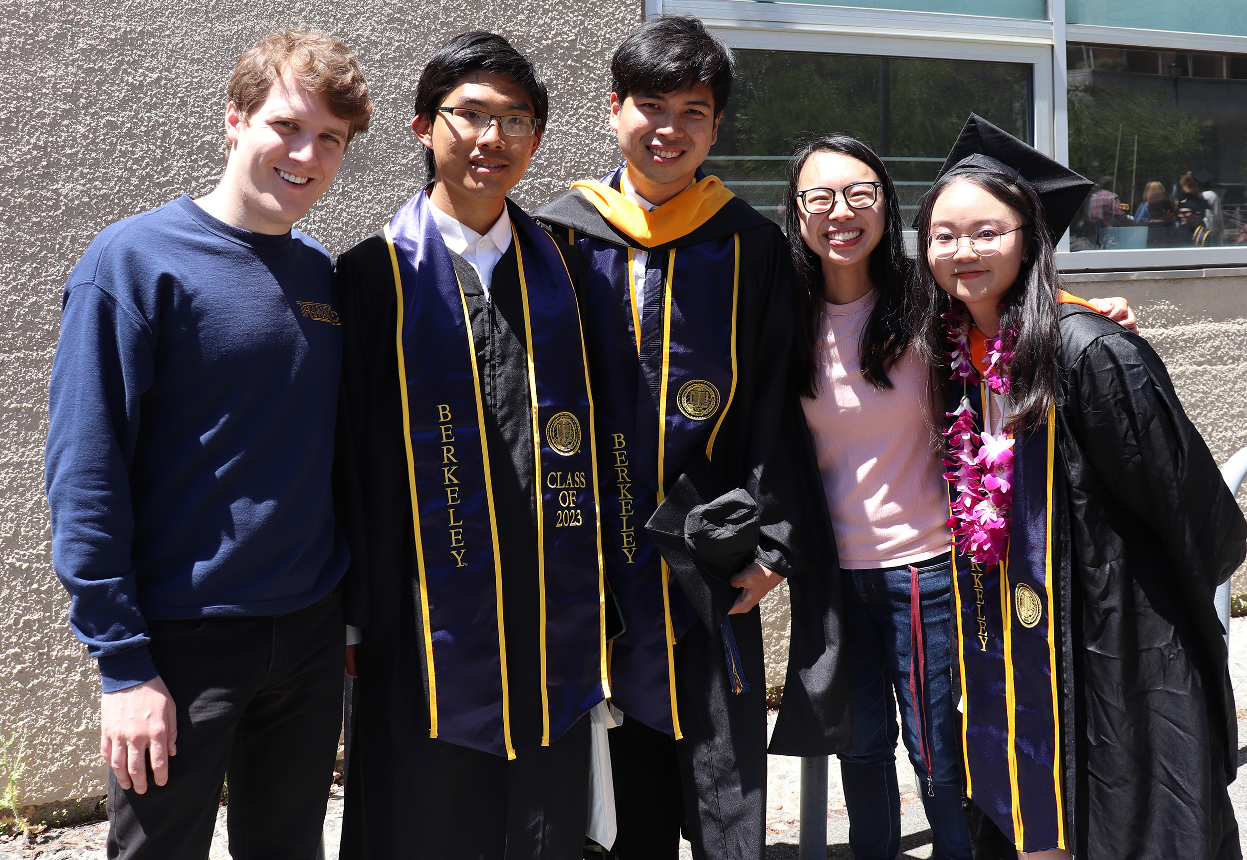 Newly minted Masters students celebrate Newly minted Masters students celebrate