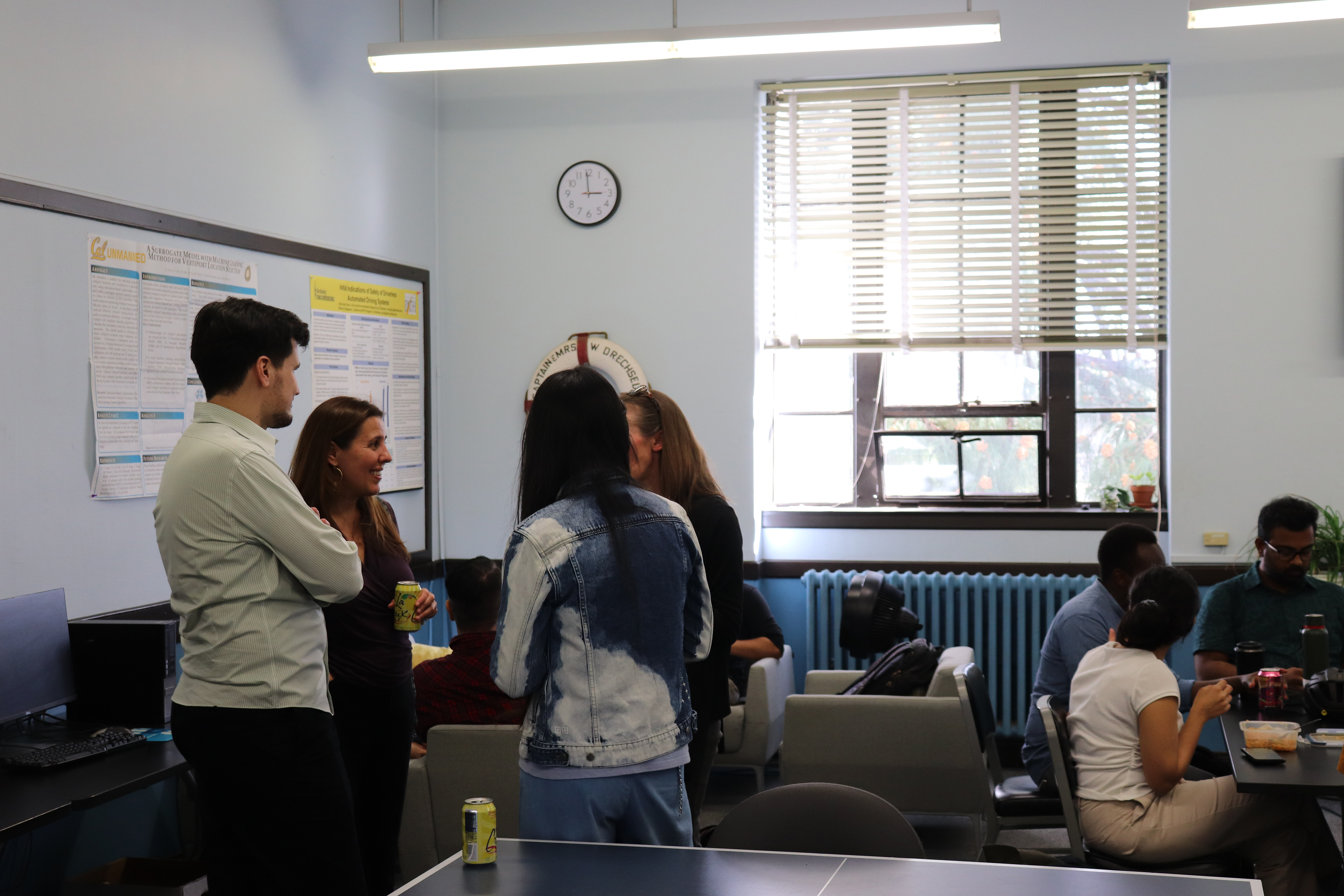 José Carpio-Pinedo conversing with seminar attendees during Cookie Hour