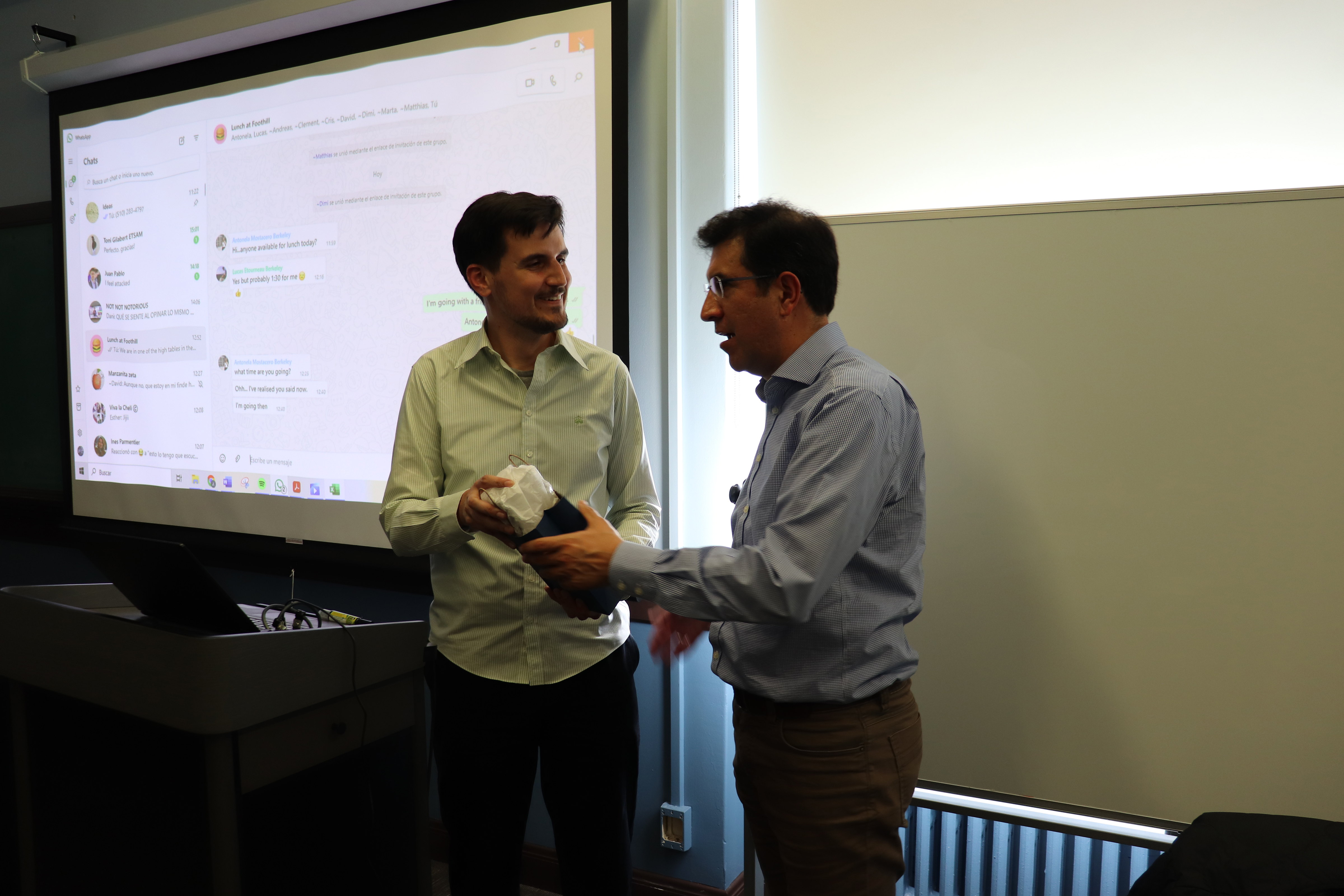 ITS Director Daniel Rodriguez handing a gift to José Carpio-Pinedo as the seminar concludes