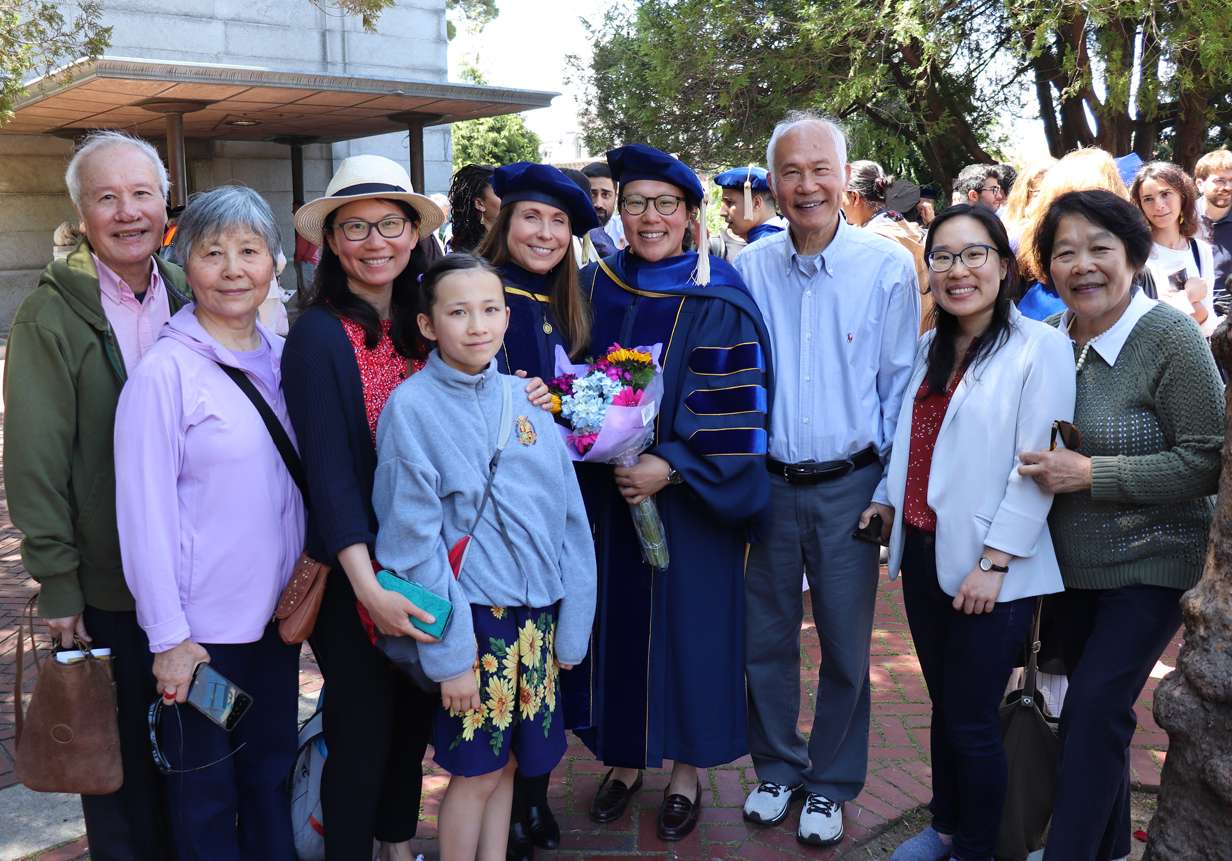 Graduate Alex Pan and family with Professor Susan Shaheen Graduate Alex Pan and family with Professor Susan Shaheen