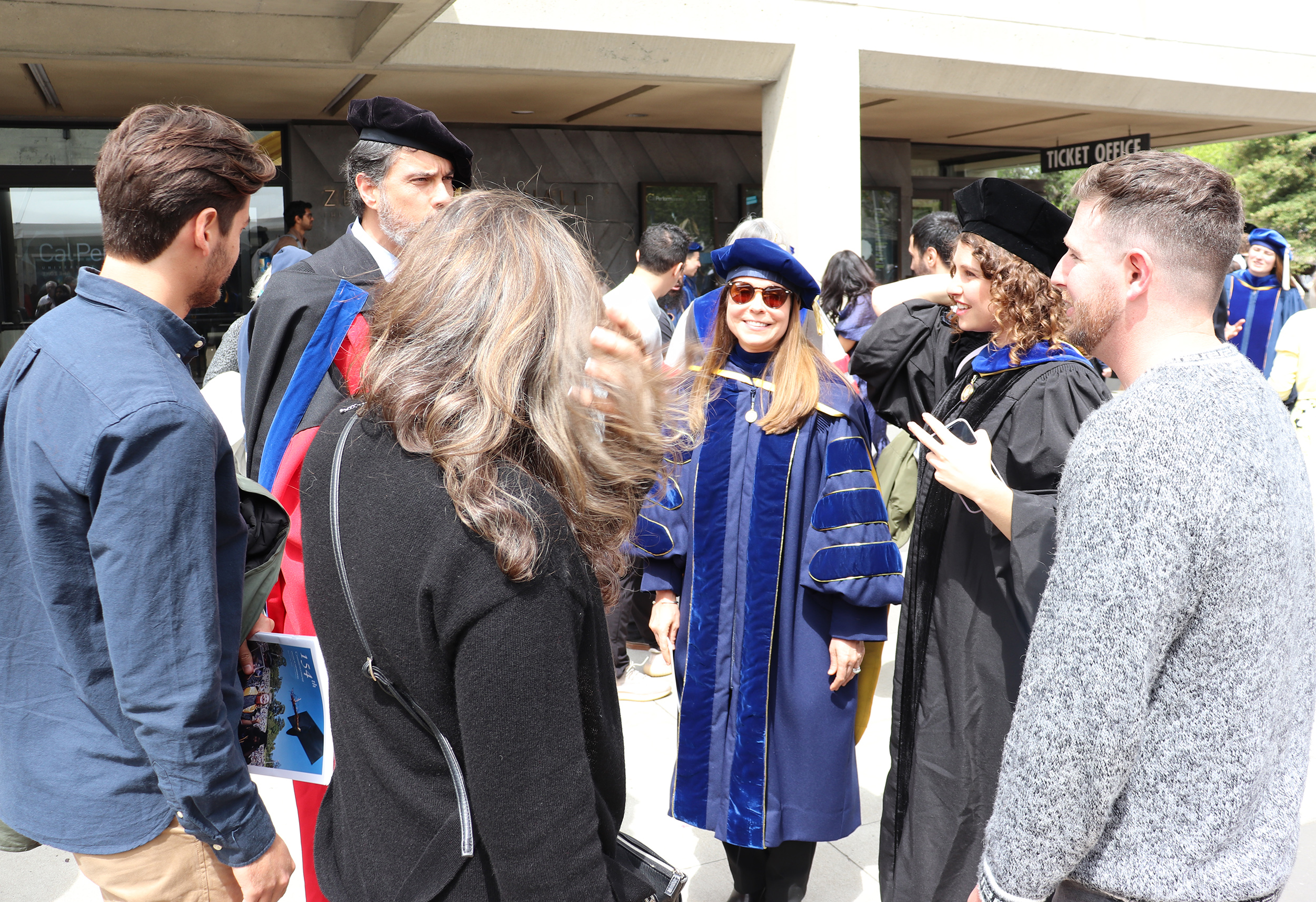 Graduate Jessica Lazarus celebrates with advisers Alexandre Bayen and Susan Shaheen