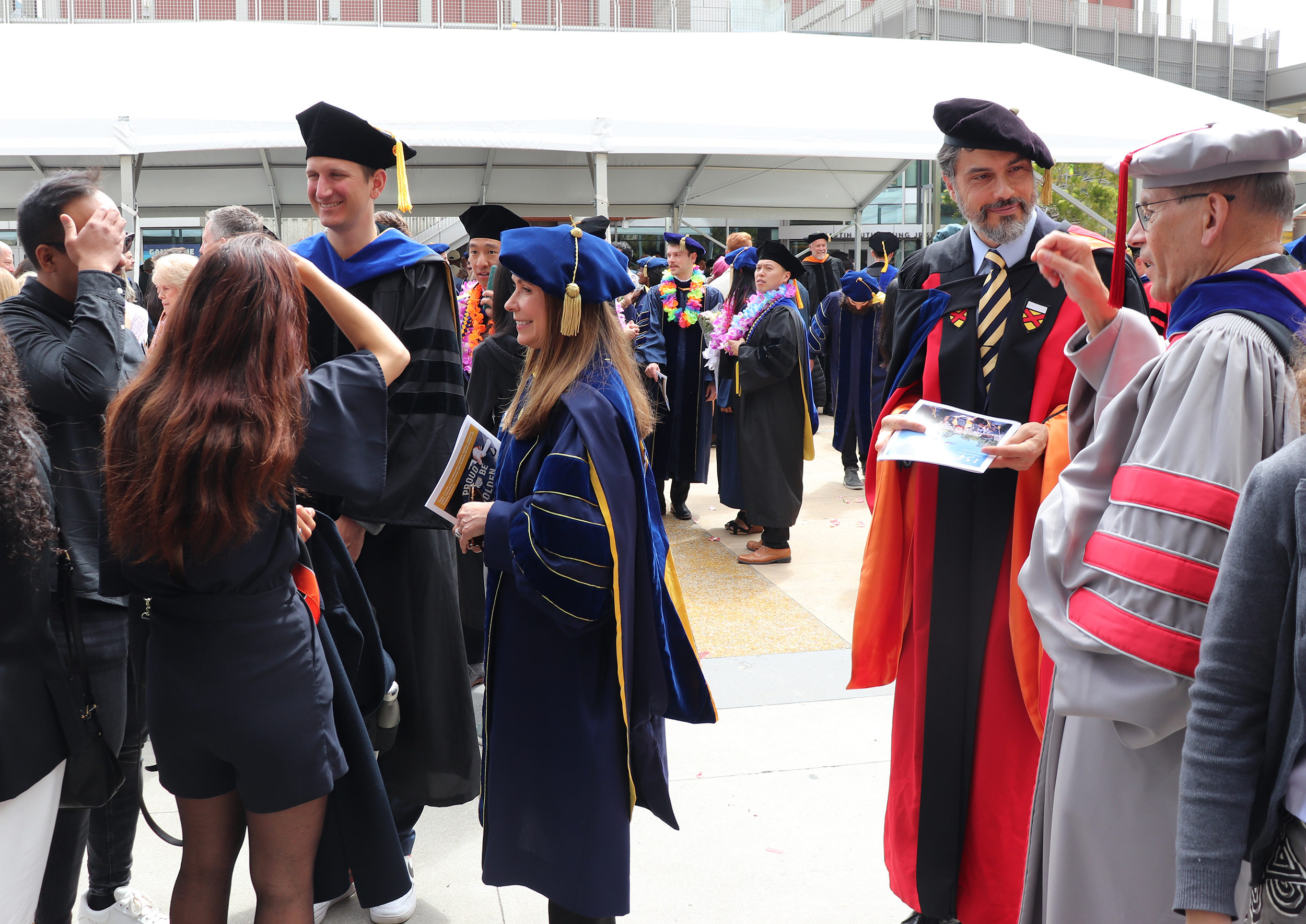 Graduate Theophile Cannabes celebrates with Professor Susan Shaheen Graduate Theophile Cannabes celebrates with Professor Susan Shaheen