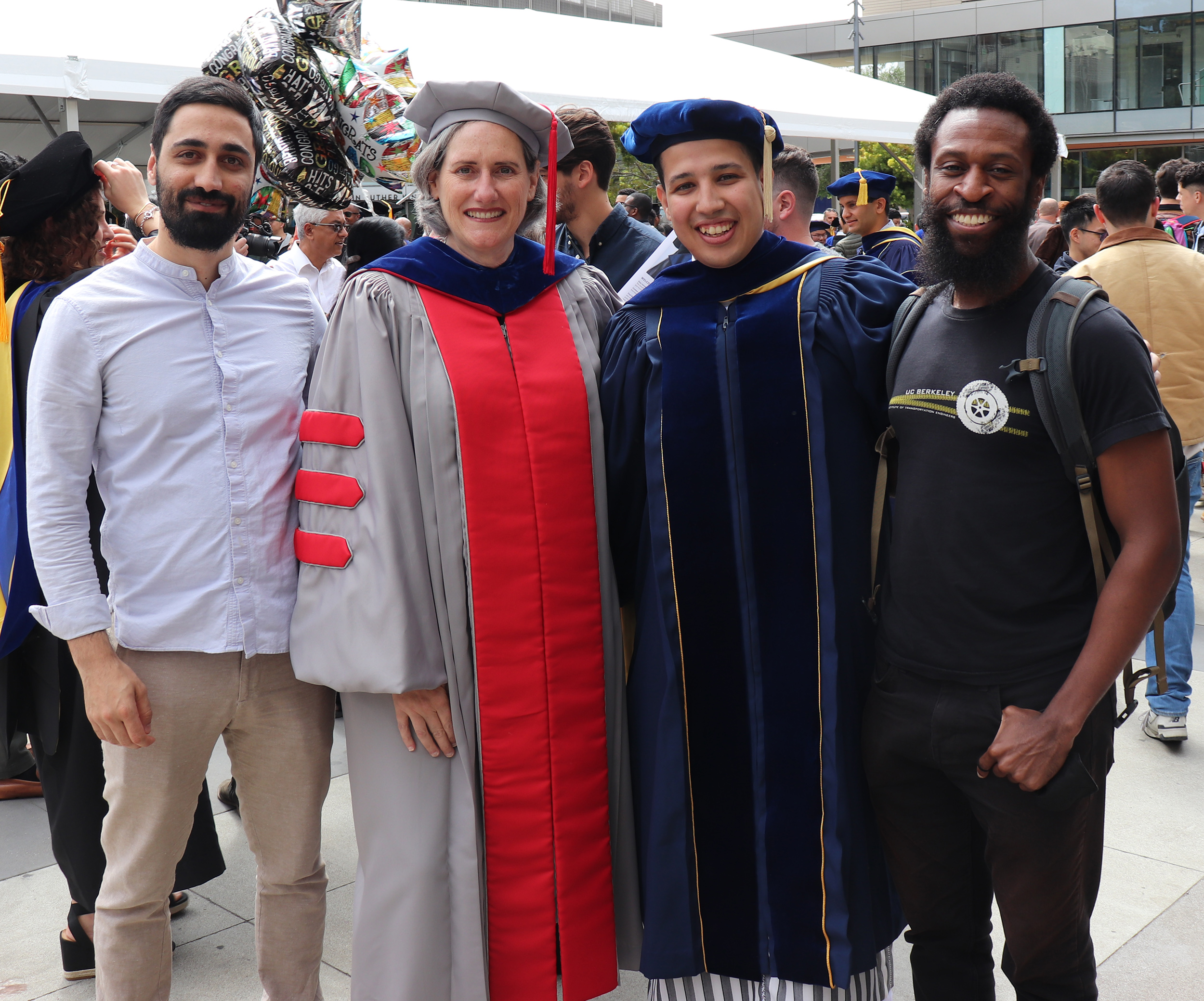 Graduate Amine Bouzaghrane celebrates with his advisor Joan Walker and alum Hassan Obeid