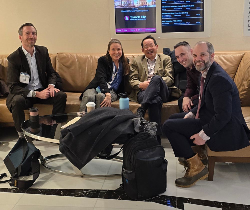 Susan Shaheen, Adam Cohen, and Chris Cherry catching up on a couch at TRBAM