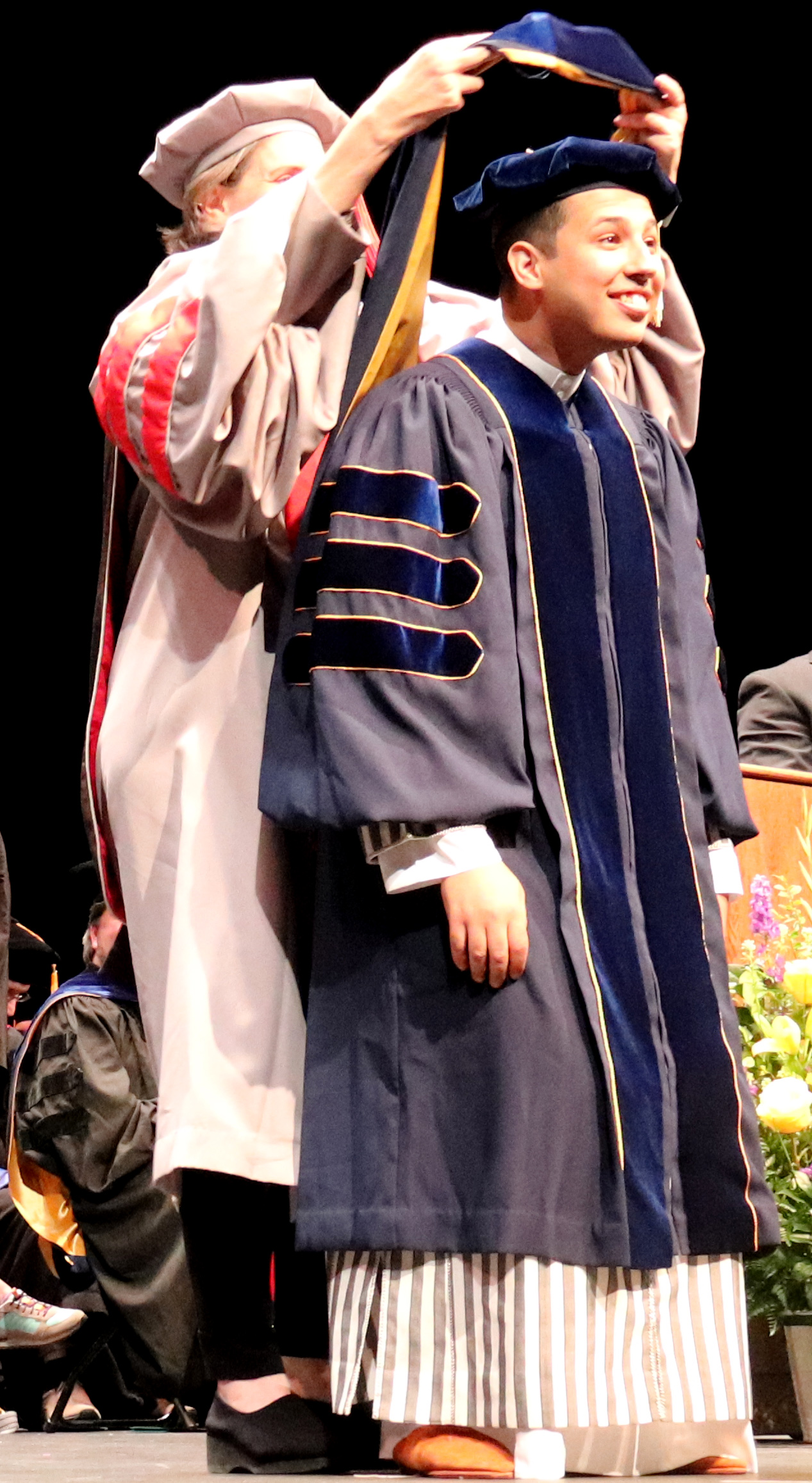 Professor Joan Walker hoods Amine Bouzaghrane Professor Joan Walker hoods Amine Bouzaghrane