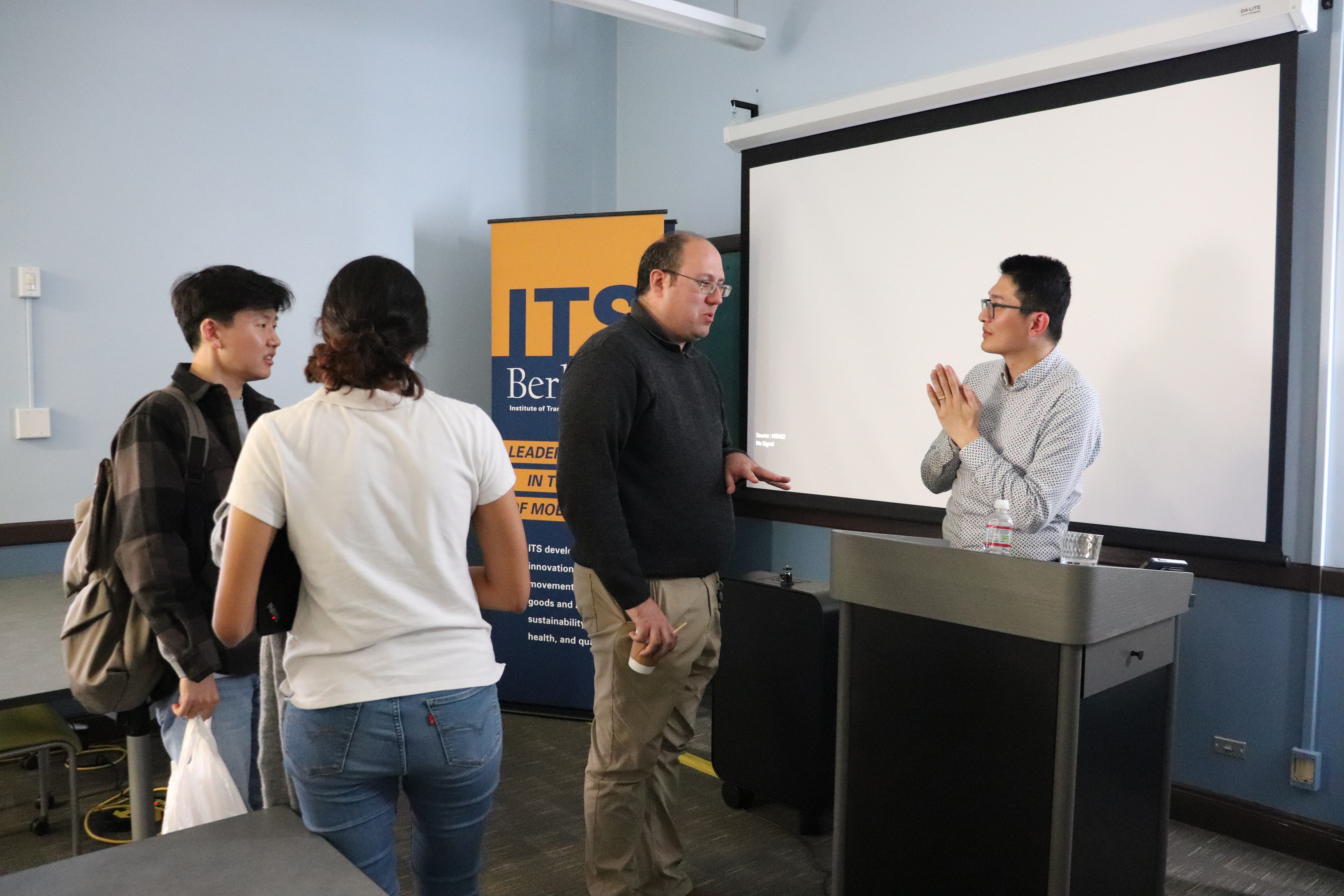 Chiwei Yan stays to answer more questions and have discussions with audience members after the ITS Seminar Chiwei Yan stays to answer more questions and have discussions with audience members after the ITS Seminar